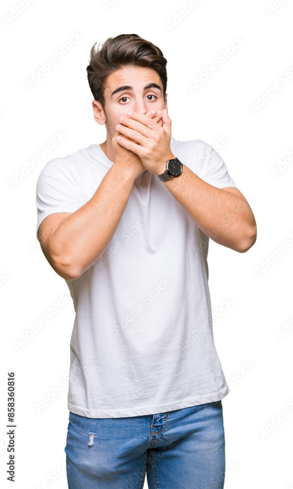 Young handsome man wearing white t-shirt over isolated background shocked covering mouth with hands for mistake. Secret concept. Young handsome man wearing white t-shirt over isolated background shocked covering mouth with hands for mistake. Secret concept.