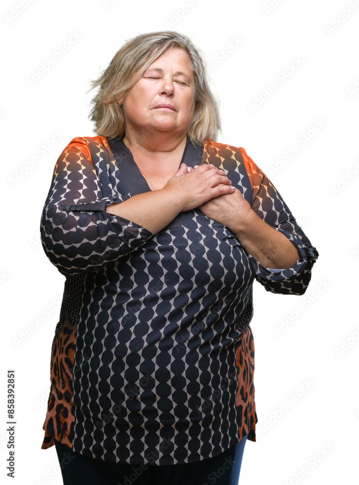 Senior plus size caucasian woman over isolated background smiling with hands on chest with closed eyes and grateful gesture on face. Health concept. Senior plus size caucasian woman over isolated background smiling with hands on chest with closed eyes and grateful gesture on face. Health concept.