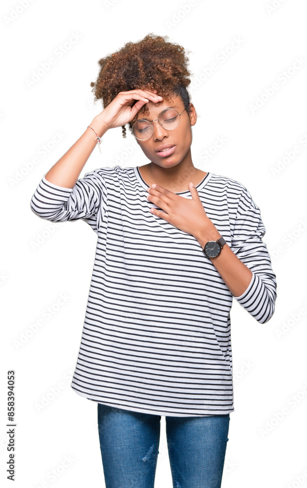 Beautiful young african american woman wearing glasses over isolated background Touching forehead for illness and fever, flu and cold, virus sick Beautiful young african american woman wearing glasses over isolated background Touching forehead for illness and fever, flu and cold, virus sick