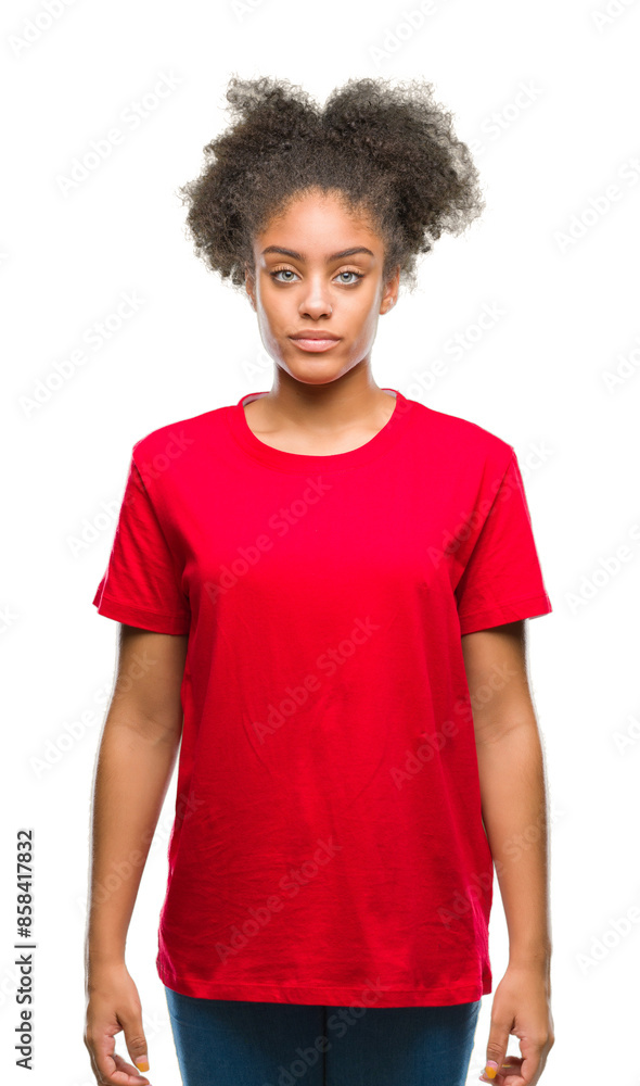 Young afro american woman over isolated background with serious expression on face. Simple and natural looking at the camera. Young afro american woman over isolated background with serious expression on face. Simple and natural looking at the camera.