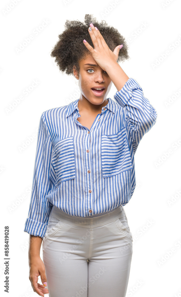 Young afro american woman over isolated background surprised with hand on head for mistake, remember error. Forgot, bad memory concept. Young afro american woman over isolated background surprised with hand on head for mistake, remember error. Forgot, bad memory concept.