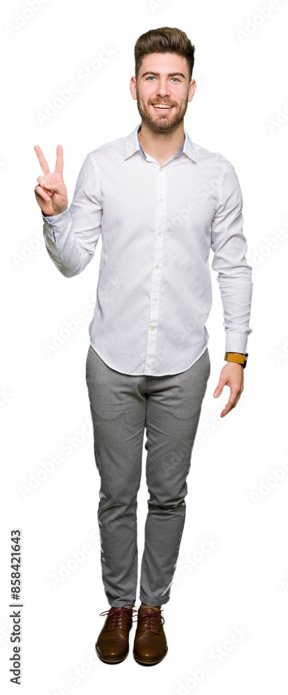 Young handsome business man showing and pointing up with fingers number two while smiling confident and happy. Young handsome business man showing and pointing up with fingers number two while smiling confident and happy.