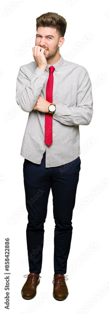 Young handsome business man looking stressed and nervous with hands on mouth biting nails. Anxiety problem. Young handsome business man looking stressed and nervous with hands on mouth biting nails. Anxiety problem.