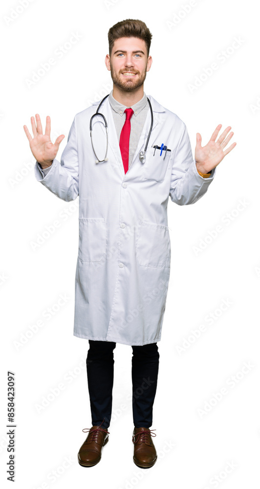 Young handsome doctor man wearing medical coat showing and pointing up with fingers number ten while smiling confident and happy. Young handsome doctor man wearing medical coat showing and pointing up with fingers number ten while smiling confident and happy.
