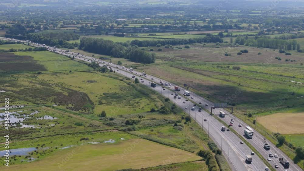 Aerial view of motorway going through the countryside in the United Kingdom Aerial view of motorway going through the countryside in the United Kingdom