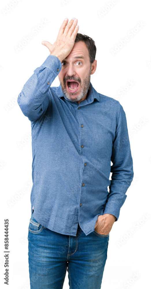 Handsome middle age elegant senior man over isolated background surprised with hand on head for mistake, remember error. Forgot, bad memory concept. Handsome middle age elegant senior man over isolated background surprised with hand on head for mistake, remember error. Forgot, bad memory concept.