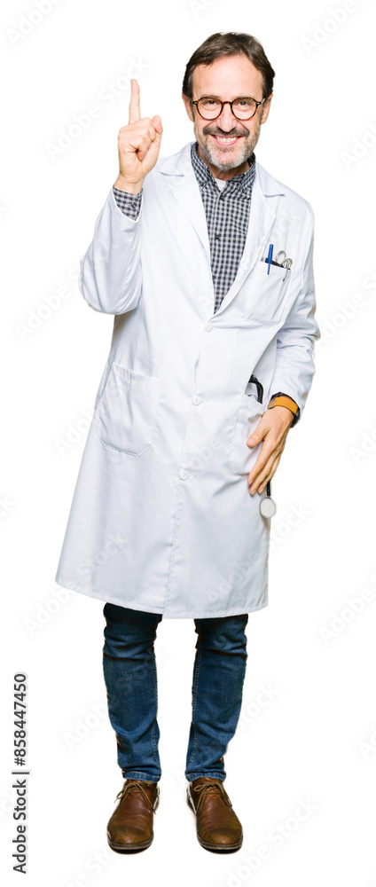 Middle age doctor men wearing medical coat pointing finger up with successful idea. Exited and happy. Number one. Middle age doctor men wearing medical coat pointing finger up with successful idea. Exited and happy. Number one.