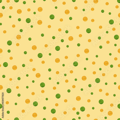 Abstract polka dot seamless pattern. Orange and green random watercolor textured dots on yellow background. Colorful dotted pattern. Retro seamless pattern for textiles, wrapping paper, scrapbook.