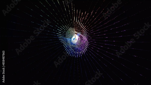 Pink, blue, purple energy spiral animation background. A rotating, moving unknown spiral-shaped object. 