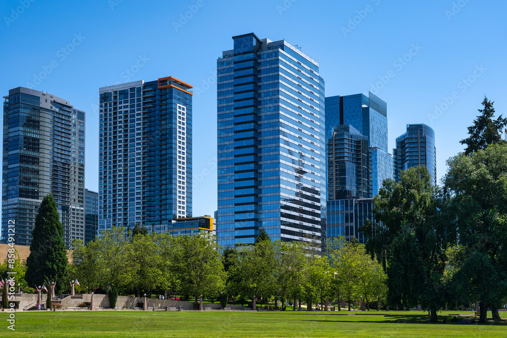 2024-06-21 DOWNTOWN BELLEVUE CITY HALL PARK WITH DOWNTOWN BUILDINGS AND A CLEAR BLUE SKY 2024-06-21 DOWNTOWN BELLEVUE CITY HALL PARK WITH DOWNTOWN BUILDINGS AND A CLEAR BLUE SKY