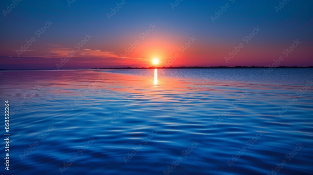 Obraz premium Peaceful Sunset Reflection Over Still Water