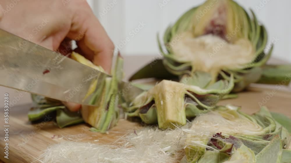 Cleaning Artichoke Parts of Leaves, Preparing a Healthy Lunch. Cleaning Artichoke Parts of Leaves, Preparing a Healthy Lunch.