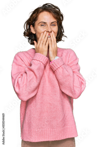 Young hispanic woman wearing casual clothes laughing and embarrassed giggle covering mouth with hands, gossip and scandal concept