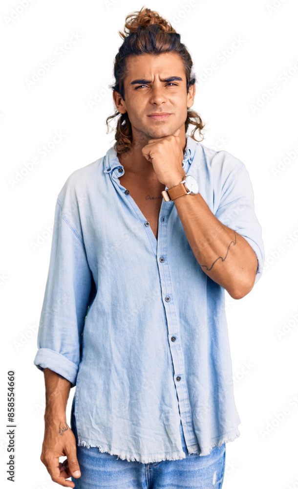Young hispanic man wearing summer style touching painful neck, sore throat for flu, clod and infection Young hispanic man wearing summer style touching painful neck, sore throat for flu, clod and infection