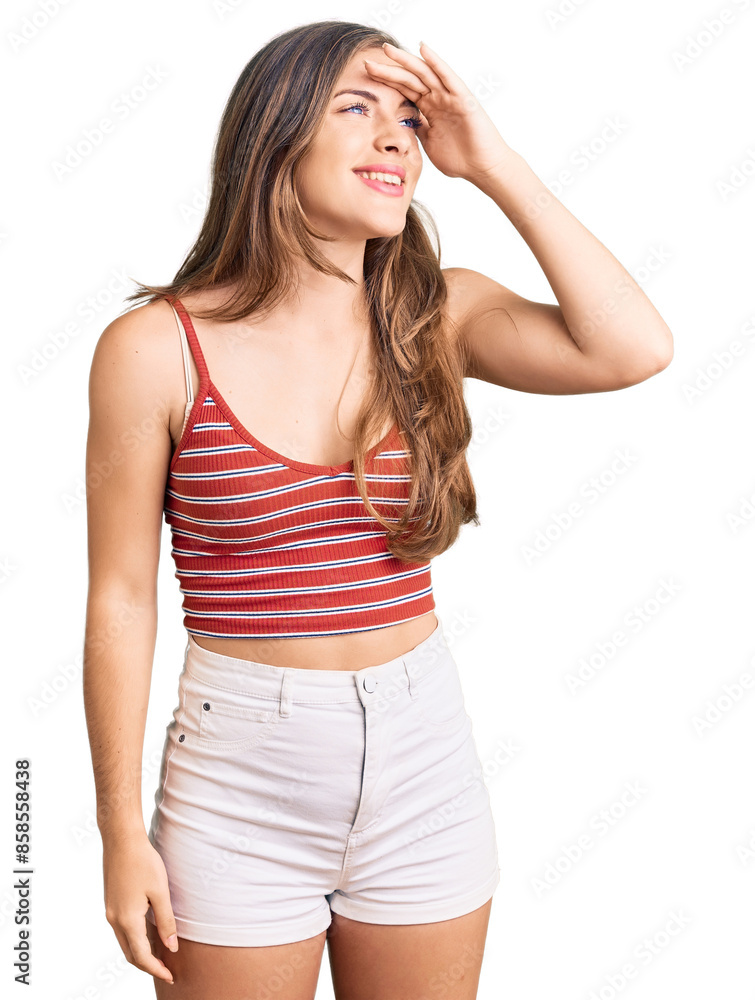 Beautiful caucasian young woman wearing casual clothes very happy and smiling looking far away with hand over head. searching concept. Beautiful caucasian young woman wearing casual clothes very happy and smiling looking far away with hand over head. searching concept.