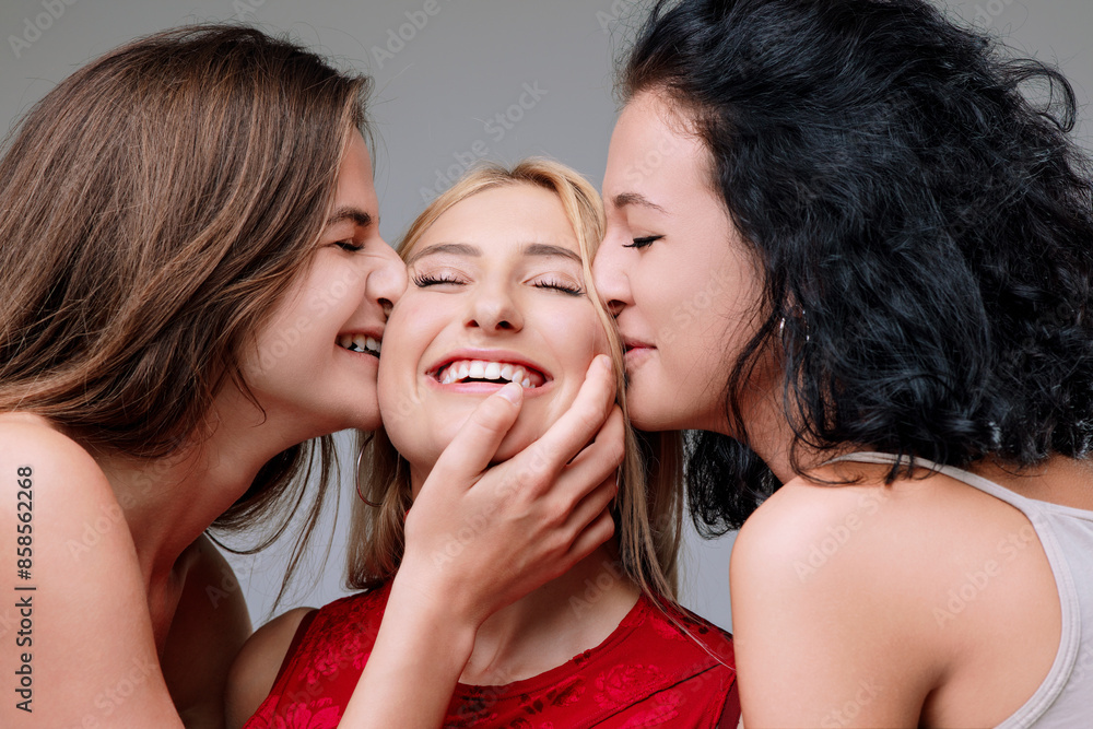 Three girls hugging and smiling Three girls hugging and smiling