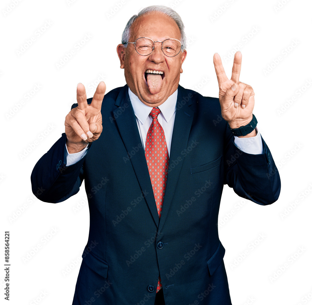 Senior man with grey hair wearing business suit and glasses smiling with tongue out showing fingers of both hands doing victory sign. number two. Senior man with grey hair wearing business suit and glasses smiling with tongue out showing fingers of both hands doing victory sign. number two.