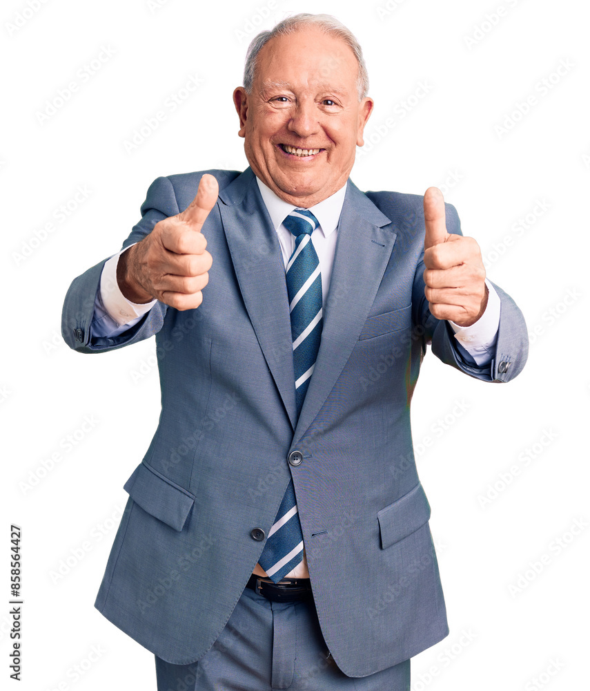 Senior handsome grey-haired man wearing elegant suit approving doing positive gesture with hand, thumbs up smiling and happy for success. winner gesture. Senior handsome grey-haired man wearing elegant suit approving doing positive gesture with hand, thumbs up smiling and happy for success. winner gesture.