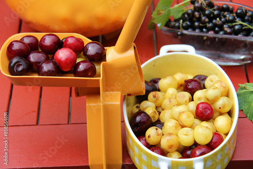 Pitting cherries for jam