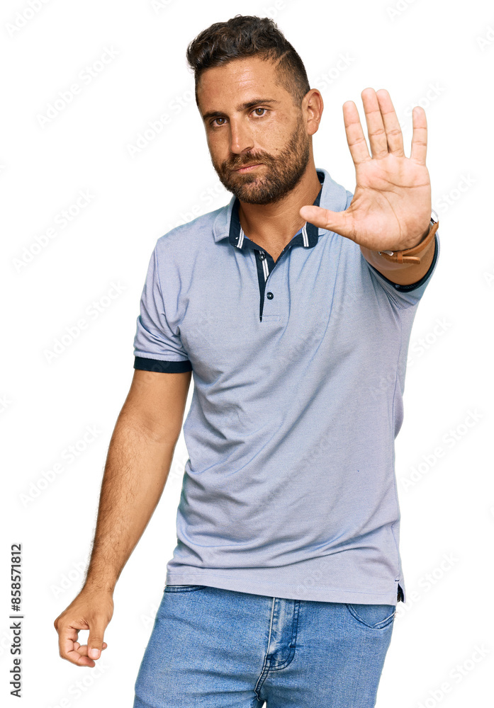 Handsome man with beard wearing casual clothes doing stop sing with palm of the hand. warning expression with negative and serious gesture on the face. Handsome man with beard wearing casual clothes doing stop sing with palm of the hand. warning expression with negative and serious gesture on the face.