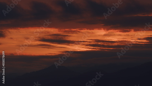 Clouds Over The Mountains And Morning Light Shining Through. Abstract Nature Background.