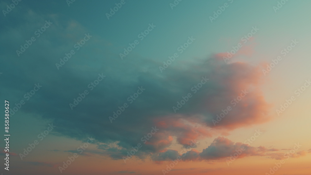Obraz premium Golden Hours Sky. Light Pink Clouds In Blue Sky During Dawn Sunset. Pink And Purple Cotton Candy Skies.