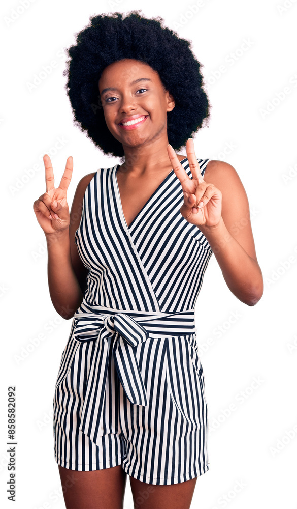 Φωτογραφία Young african american woman wearing casual clothes smiling looking to the camera showing fingers doing victory sign