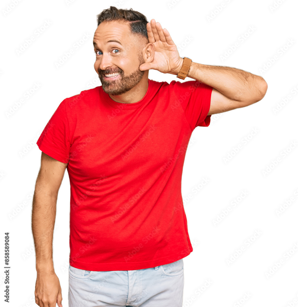 Φωτογραφία Handsome middle age man wearing casual red tshirt smiling with hand over ear listening an hearing to rumor or gossip