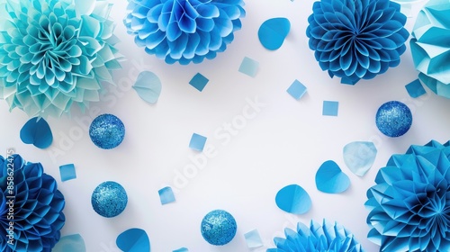 Blue festive paper decorations on white backdrop with space for wording Ideal for weddings or birthdays