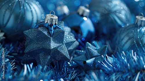 Blue Christmas ornaments on a blue tinsel background AIG51A. photo