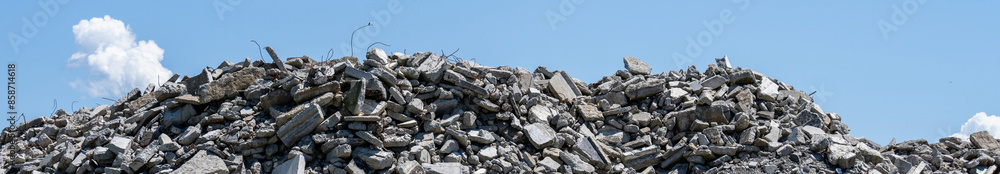 Large pile of broken up concrete and rebar, outdoor yard for construction and demolition debris
Large pile of broken up concrete and rebar, outdoor yard for construction and demolition debris