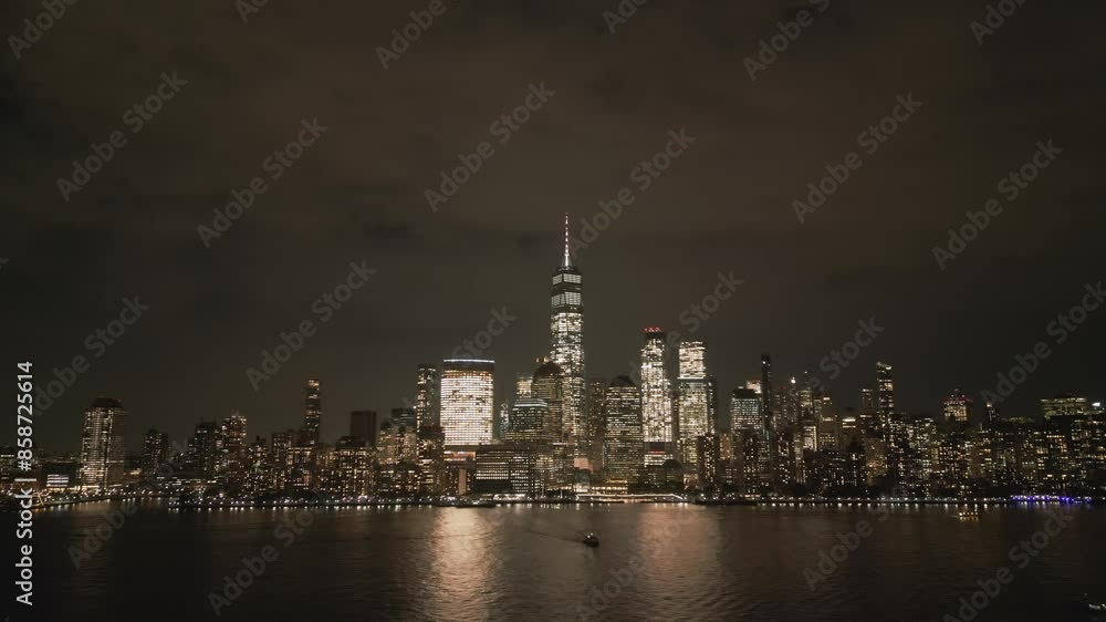NYC, Manhattan at night city lights. Night in Manhattan, NYC aerial view. New York City, Illuminated NYC view from drone. NYC, Manhattan skyline. Night city scene NY, USA.