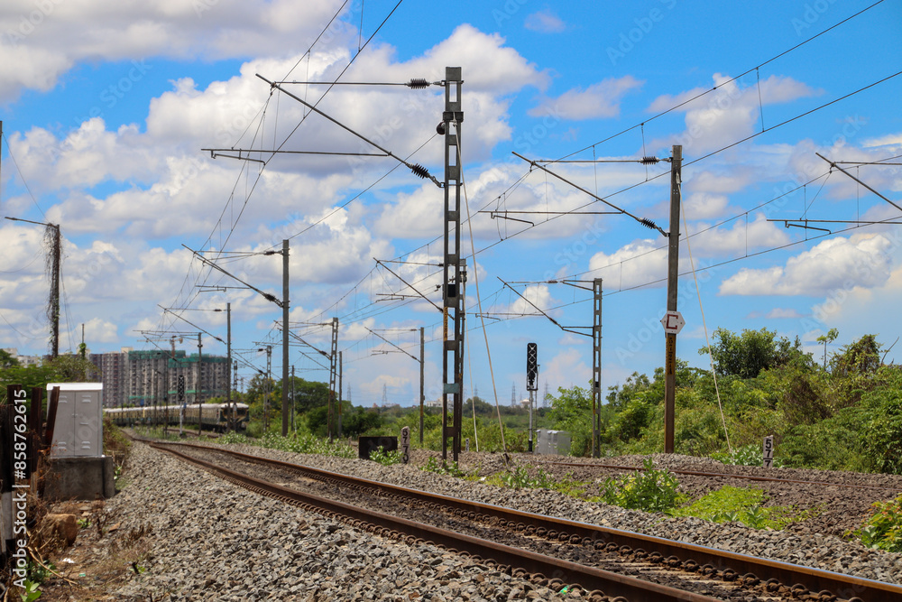 railway track in the countryside near Chennai city with beautiful clouds on background railway track in the countryside near Chennai city with beautiful clouds on background