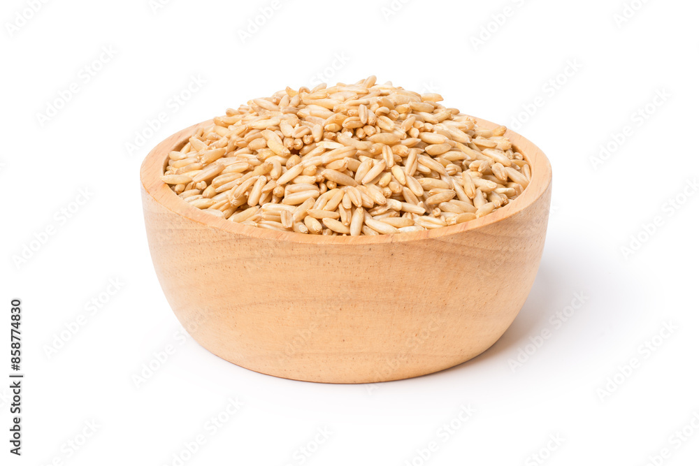 Oat rice in wooden bowl isolated on white background. Clipping path. Oat rice in wooden bowl isolated on white background. Clipping path.