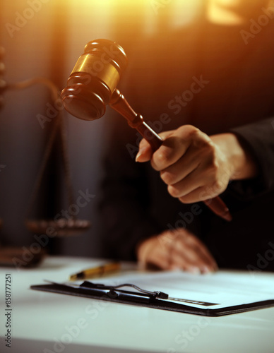 Law theme, gavel or mallet of the judge, lawyer enforcement officers, evidence-based cases taken into account in the court abount business, legislation. photo