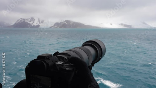 Antarctica Cruise Travel Photography Glove Hands Hold Telephoto Lens 600mm Glacier Mountains Adventure Travel photo