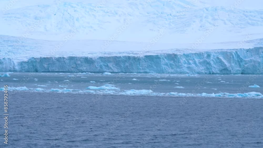 Antarctica Sailing Past Glacier Iceberg Sea Ice From Cruise Ship. Moving Past Floating Ice South Pole Climate Change Beautiful Frozen Landscape Antarctica Sailing Past Glacier Iceberg Sea Ice From Cruise Ship. Moving Past Floating Ice South Pole Climate Change Beautiful Frozen Landscape