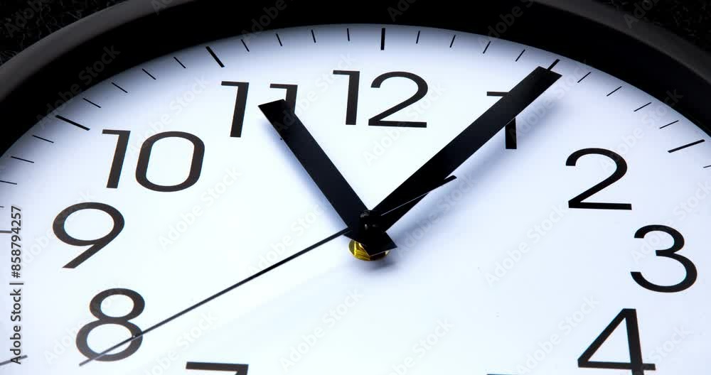 Sun and sky reflecting in the watch during the time passing by. Time lapse on a modern white Clock on black. Close up to a wall clock, with running time pointer. Wall clock show the running time. Sun and sky reflecting in the watch during the time passing by. Time lapse on a modern white Clock on black. Close up to a wall clock, with running time pointer. Wall clock show the running time.