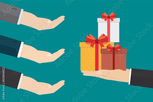 Presents for colleagues. Boss of awards bonuses of employees. Giving gifts to workers. Receives bonus concept. Hand of leader holding gift boxes.