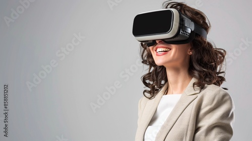 A smiling businesswoman is depicted using virtual reality glasses, emphasizing her engagement with immersive technology.