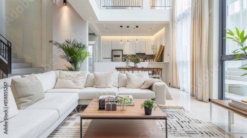 A sophisticated and airy living room design with a white canvas backdrop, Multi-dimensional furniture setup to define various functional areas, Minimalist urban loft style