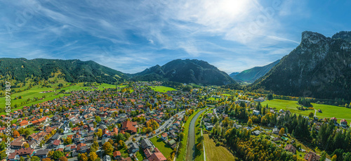Herbstlicher Ausblick auf die Region Oberammergau an einem sonnigen Oktobertag photo