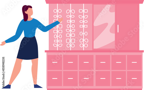 The girl is pointing to the eye glasses in show case.