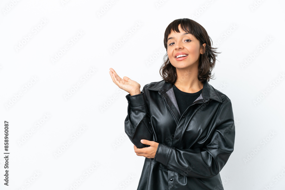Young mixed race woman isolated on white background extending hands to the side for inviting to come Young mixed race woman isolated on white background extending hands to the side for inviting to come