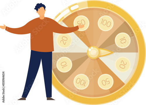 The boy is standing in front of roulette wheel.