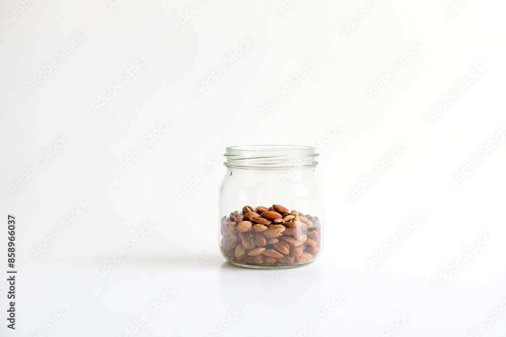 Jar of Nuts on White Background Jar of Nuts on White Background