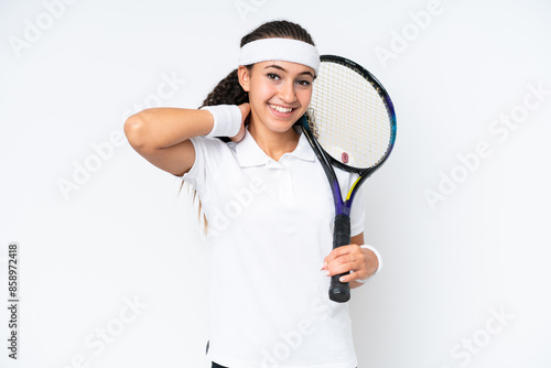 Young tennis player woman isolated on white background laughing © luismolinero