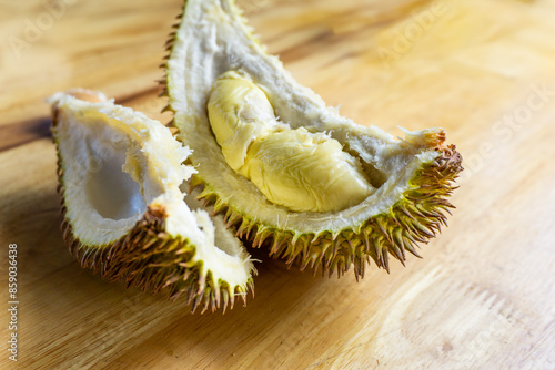 Close up fresh of durian fruit on wooden table.  photo