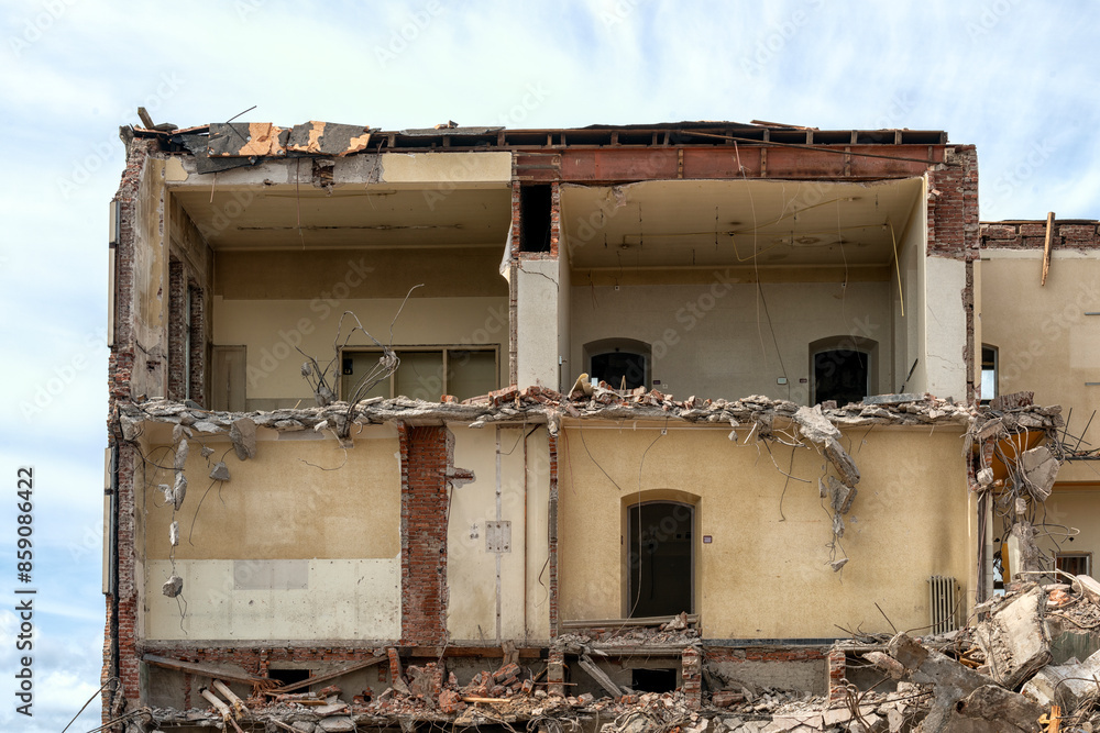 front of a demolished building where open spaces are clearly visible front of a demolished building where open spaces are clearly visible