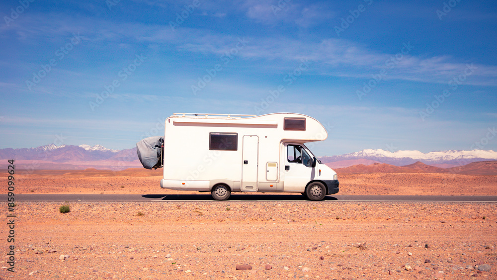 Motorhome on the road in Morocco- Road trip, adventure, travel destination concept Motorhome on the road in Morocco- Road trip, adventure, travel destination concept